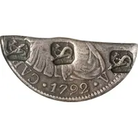 1/2 Dollar Countermark on 1/3-cut Spanish or Spanish Colonial 8 Reales, without plug