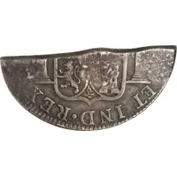 1/2 Dollar Countermark on 1/3-cut Spanish or Spanish Colonial 8 Reales, without plug