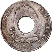 11 Bits Crenated center hole in Bolivia 8 Reales, KM# 55
