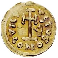 Tremissis in the name of Justinian II hand at right