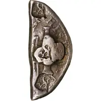 1/2 Dollar Countermark on 1/3-cut Spanish or Spanish Colonial 8 Reales, with plug