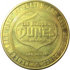 1 Dollar Gaming Token - Dunes Hotel and Country Club Las Vegas