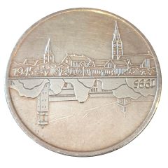 Token - Alternate views of a Village 1945-1995