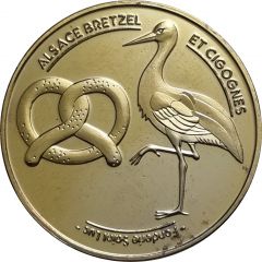 Jeton touristique - Fonderie saint Luc - Alsace - Bretzel et cigogne